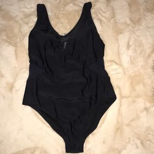 Black one piece with mesh cut outs